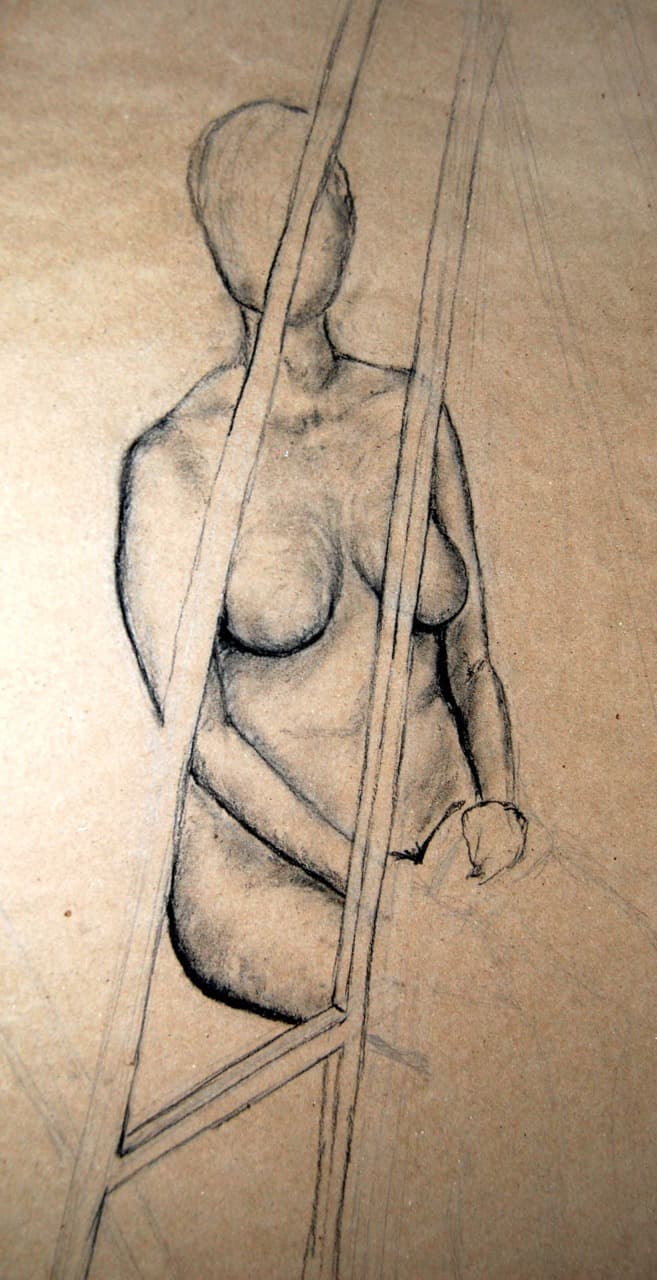 Charcoal study of a standing figure viewed through an easel